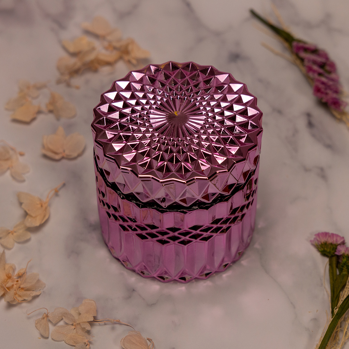 pink geometric candle jar with a lid